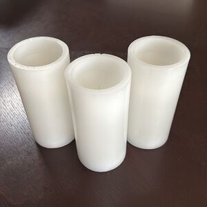 Set of three white real wax battery-operated candles